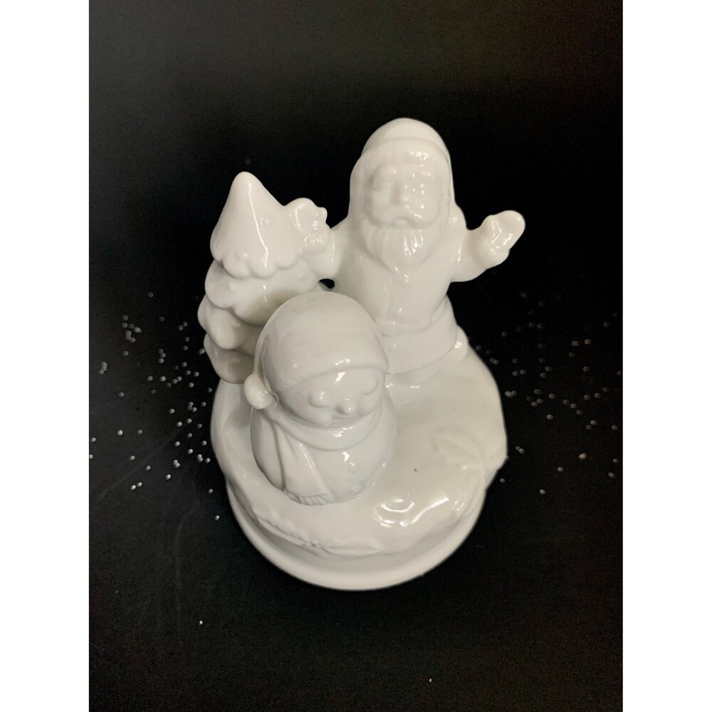Snow white rotating ceramic music box with Santa, snowman and a Christmas tree
